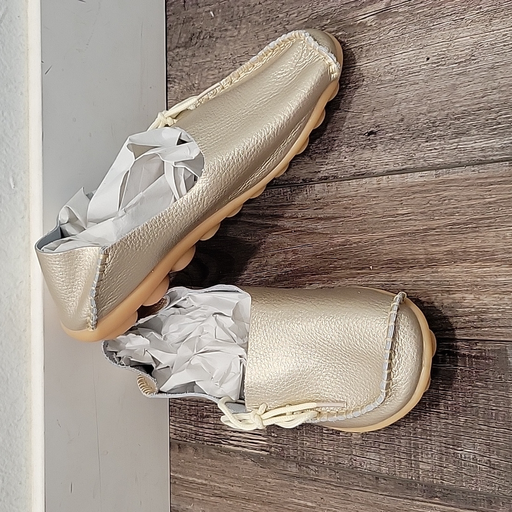 Gold colored Slip ons